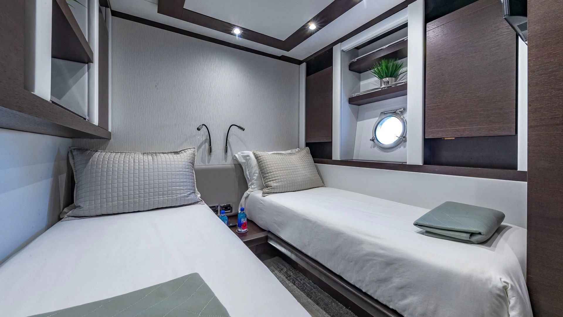 a room with two beds aboard M Yacht for Charter