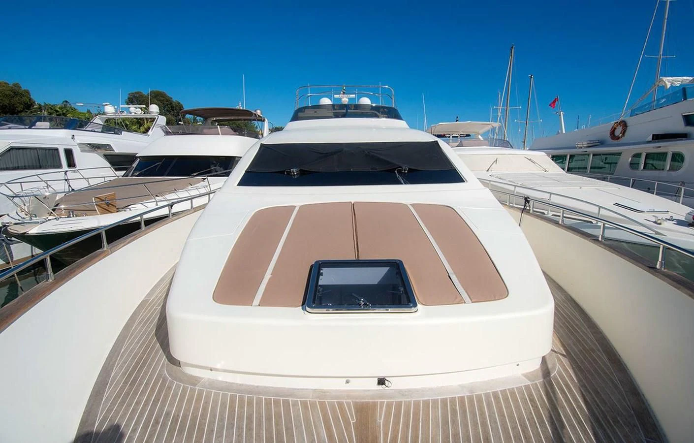 a boat on a dock aboard M Yacht for Charter