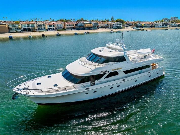 a white yacht in the water aboard ANACAPA Yacht for Sale