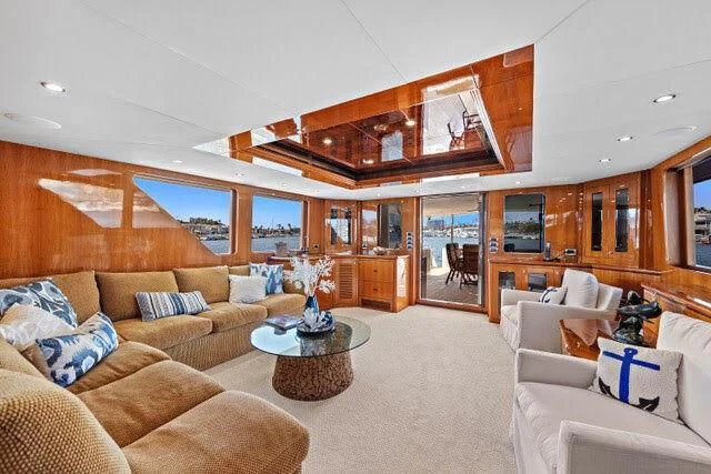 a living room with a large open window aboard ANACAPA Yacht for Sale