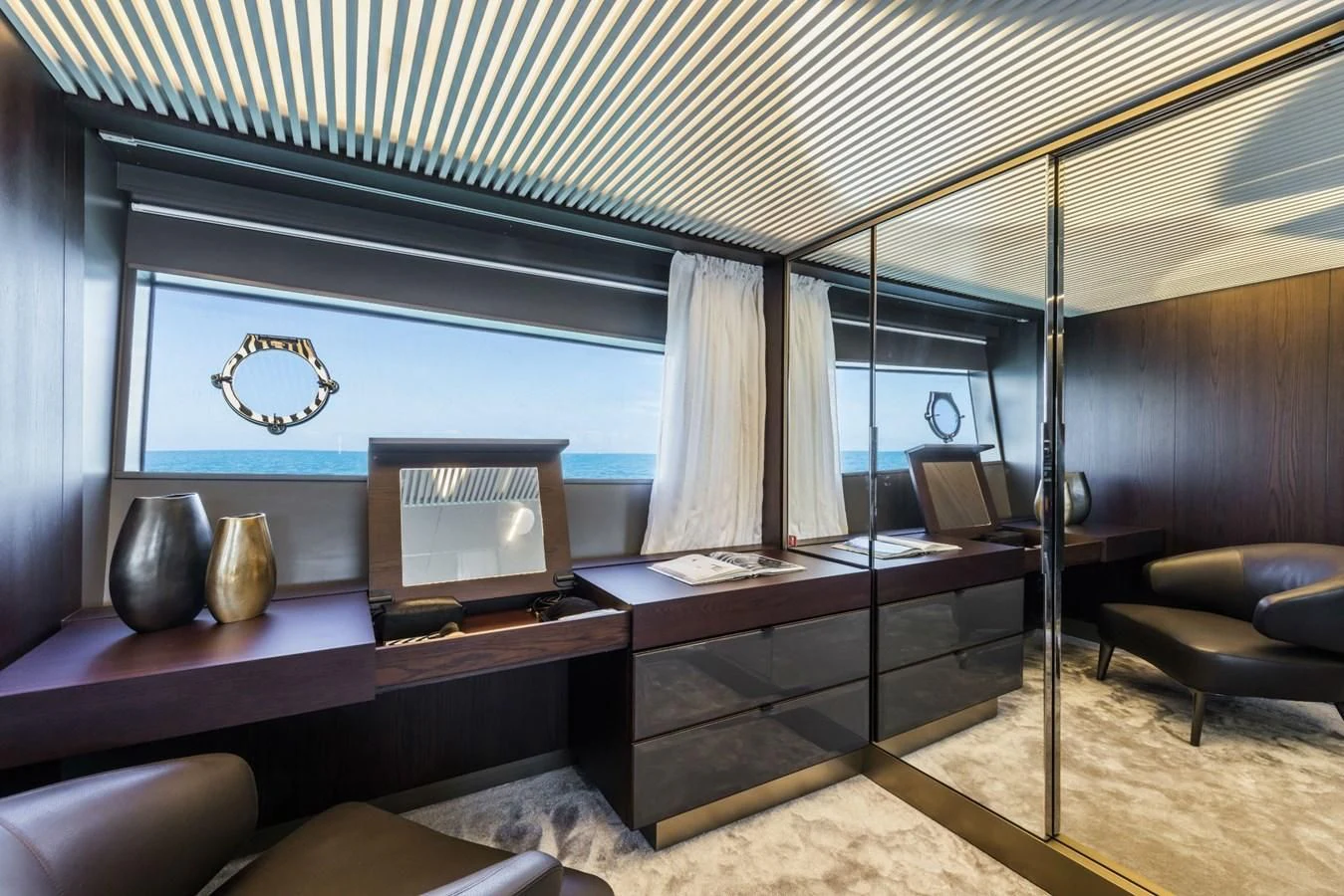 a room with a bed and a couch aboard FERRETTI YACHTS 850 Yacht for Sale