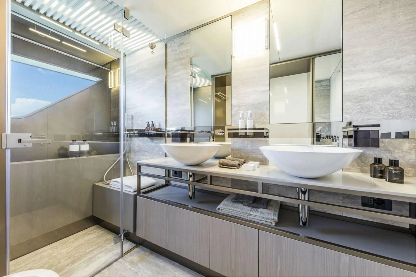 a bathroom with a large mirror aboard FERRETTI YACHTS 850 Yacht for Sale