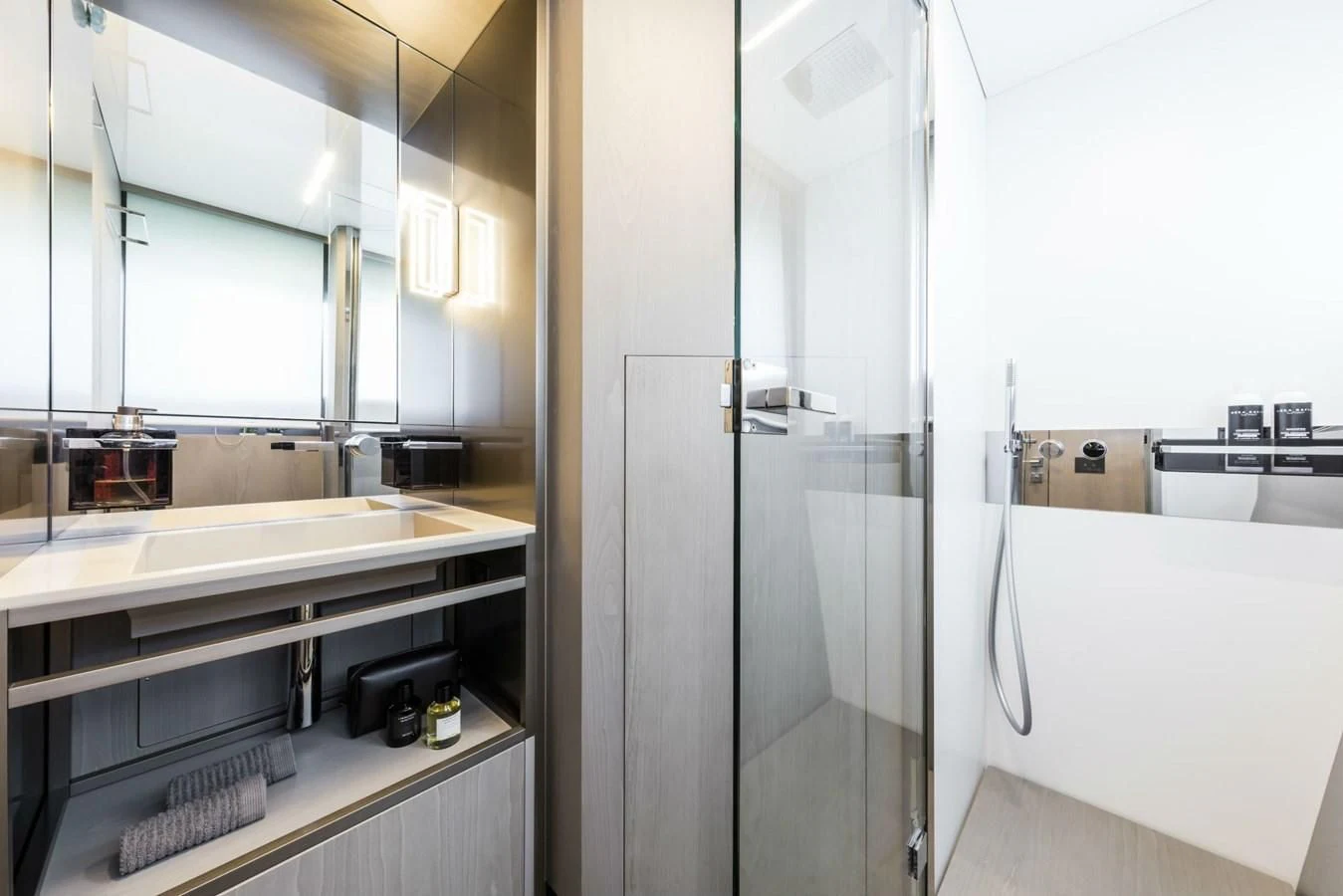 a bathroom with a glass shower aboard FERRETTI YACHTS 850 Yacht for Sale