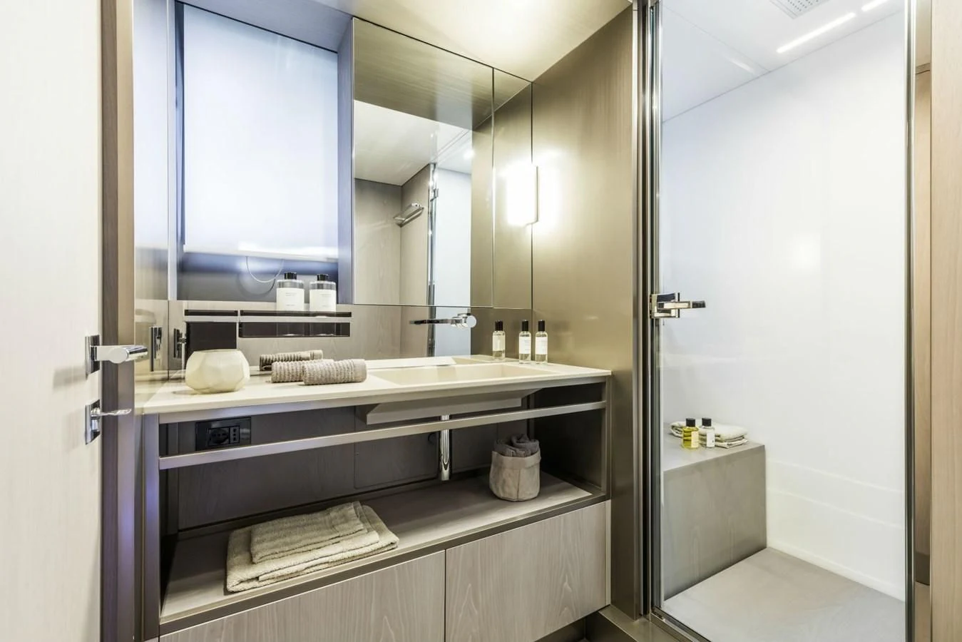 a bathroom with a large mirror aboard FERRETTI YACHTS 850 Yacht for Sale