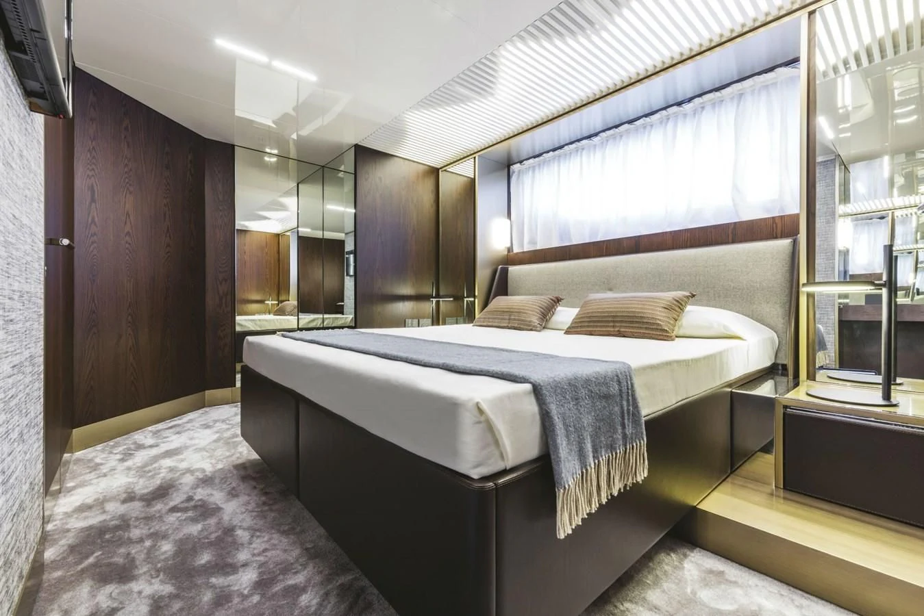a large bedroom with a large bed aboard FERRETTI YACHTS 850 Yacht for Sale