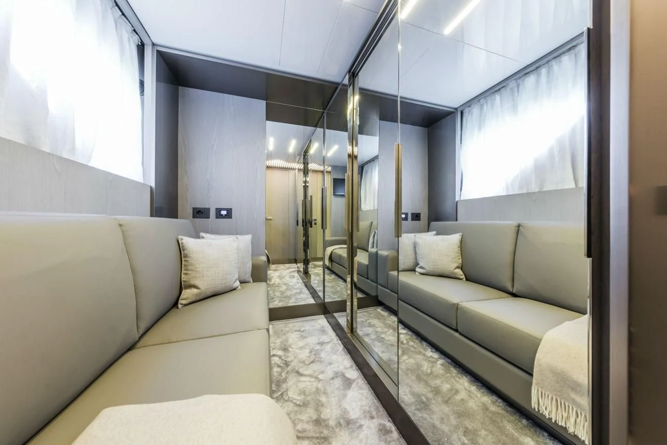 a living room with a ladder aboard FERRETTI YACHTS 850 Yacht for Sale