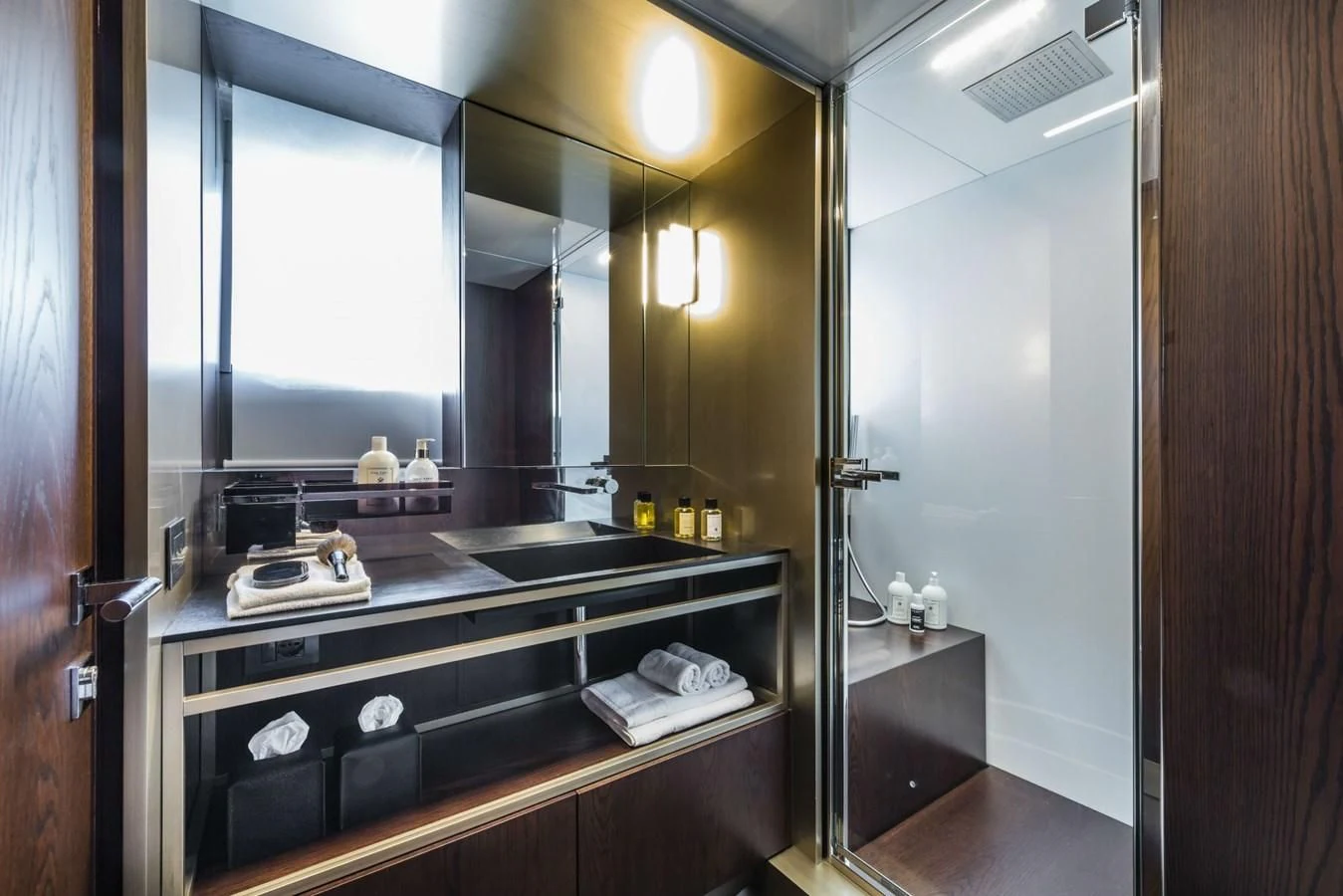 a bathroom with a sink and a mirror aboard FERRETTI YACHTS 850 Yacht for Sale