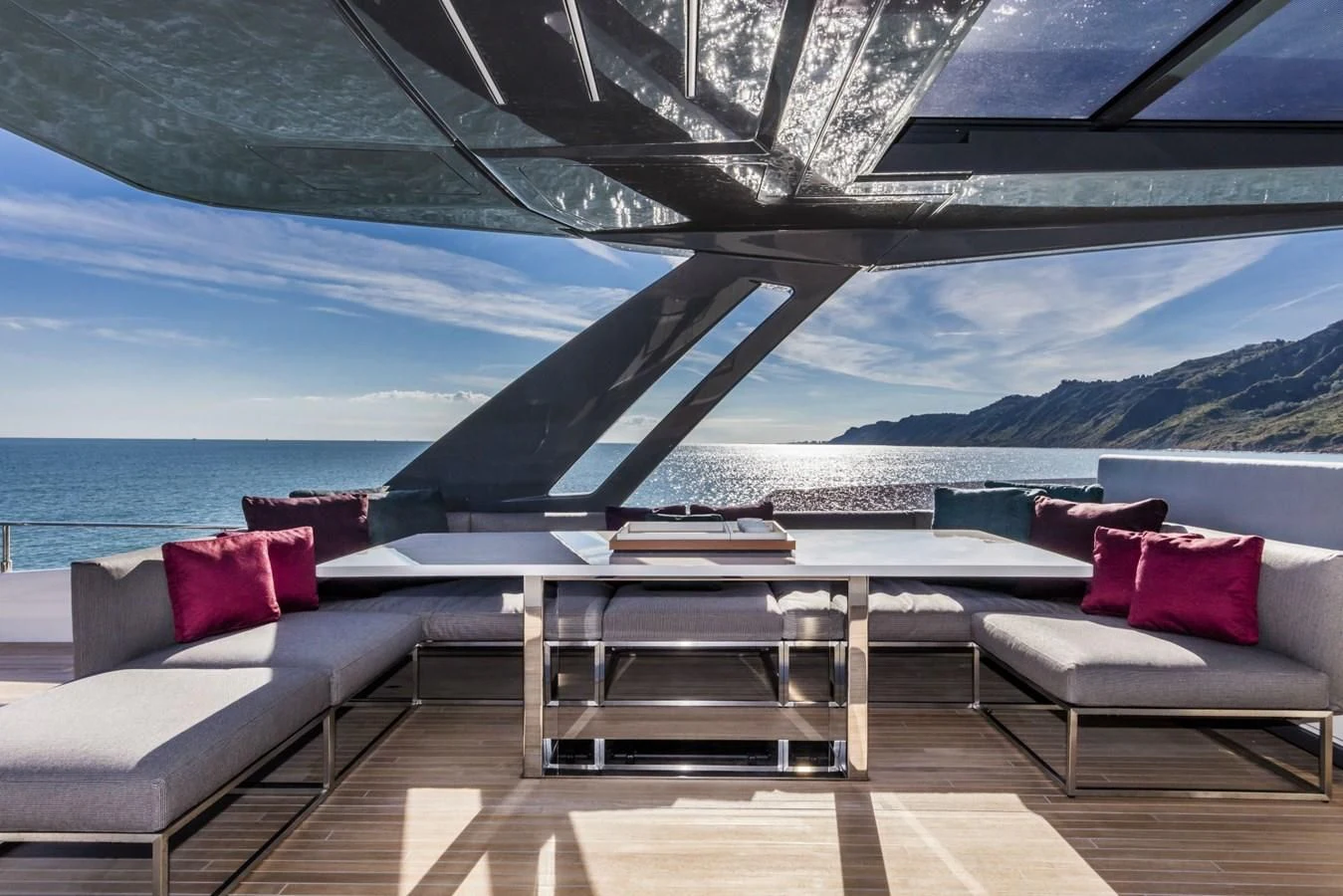 a room with a large deck overlooking a large body of water aboard FERRETTI YACHTS 850 Yacht for Sale