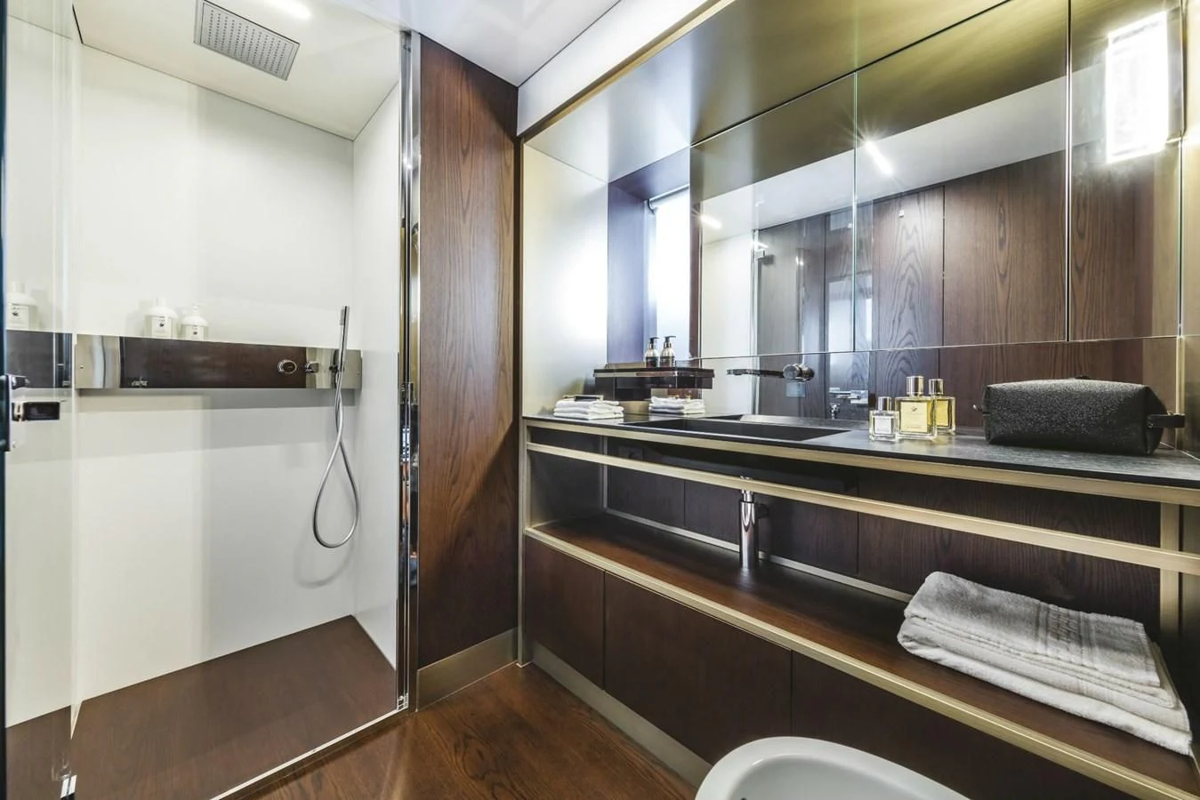 a bathroom with a countertop sink and a mirror aboard FERRETTI YACHTS 850 Yacht for Sale