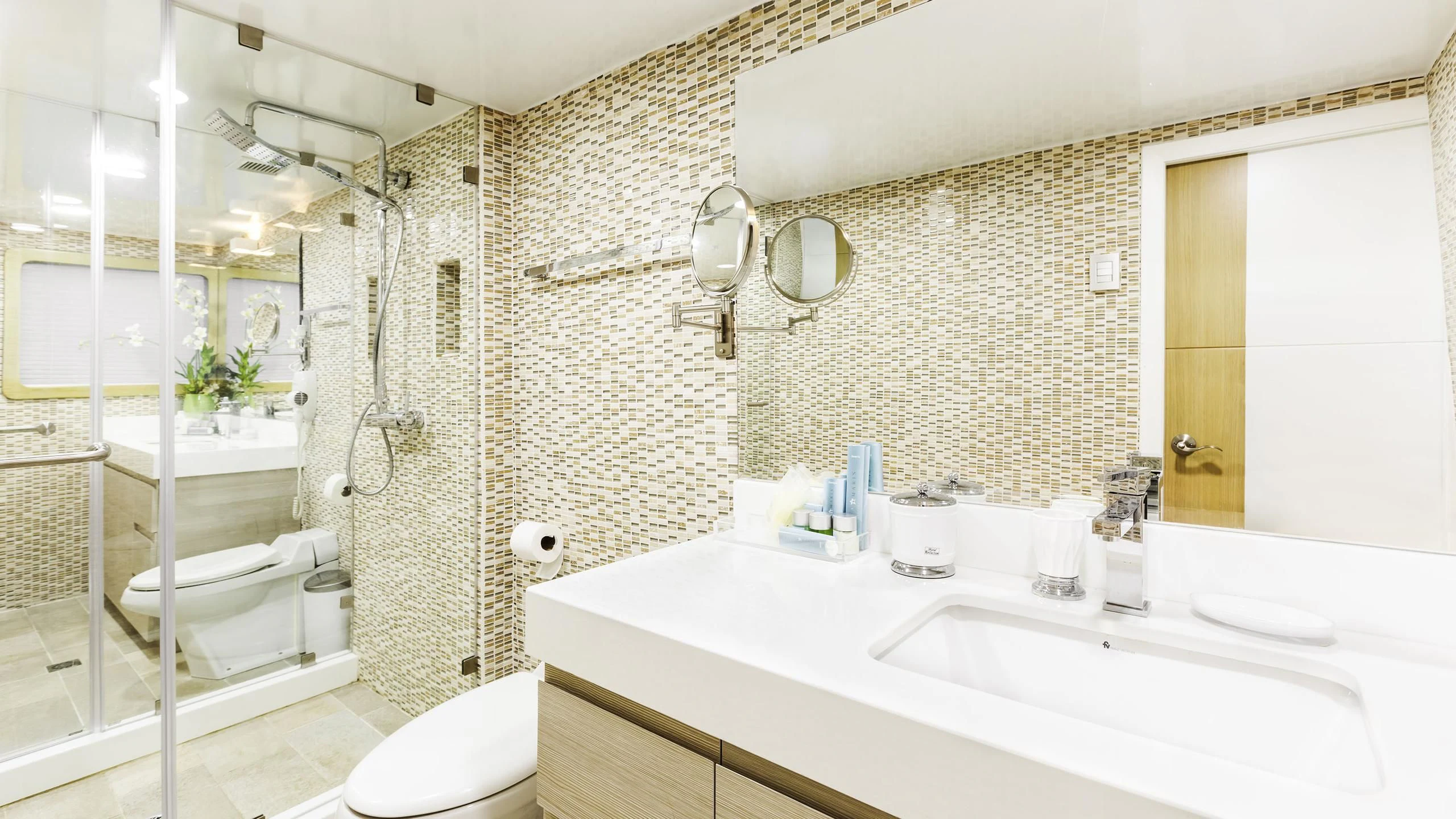 a bathroom with a shower and sink aboard GALAPAGOS EXPLORER Yacht for Sale