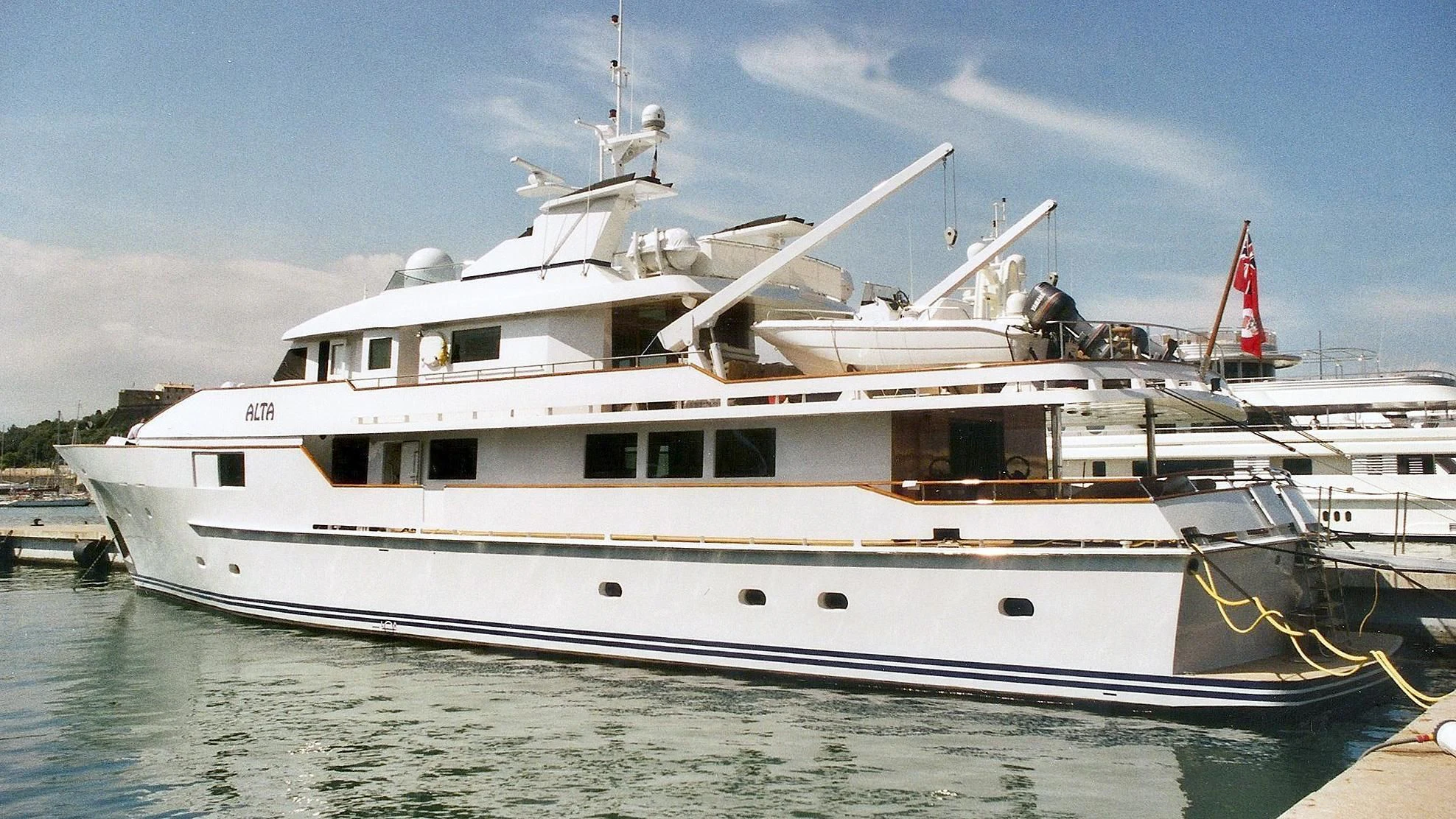 a white boat in the water aboard GALAPAGOS EXPLORER Yacht for Sale