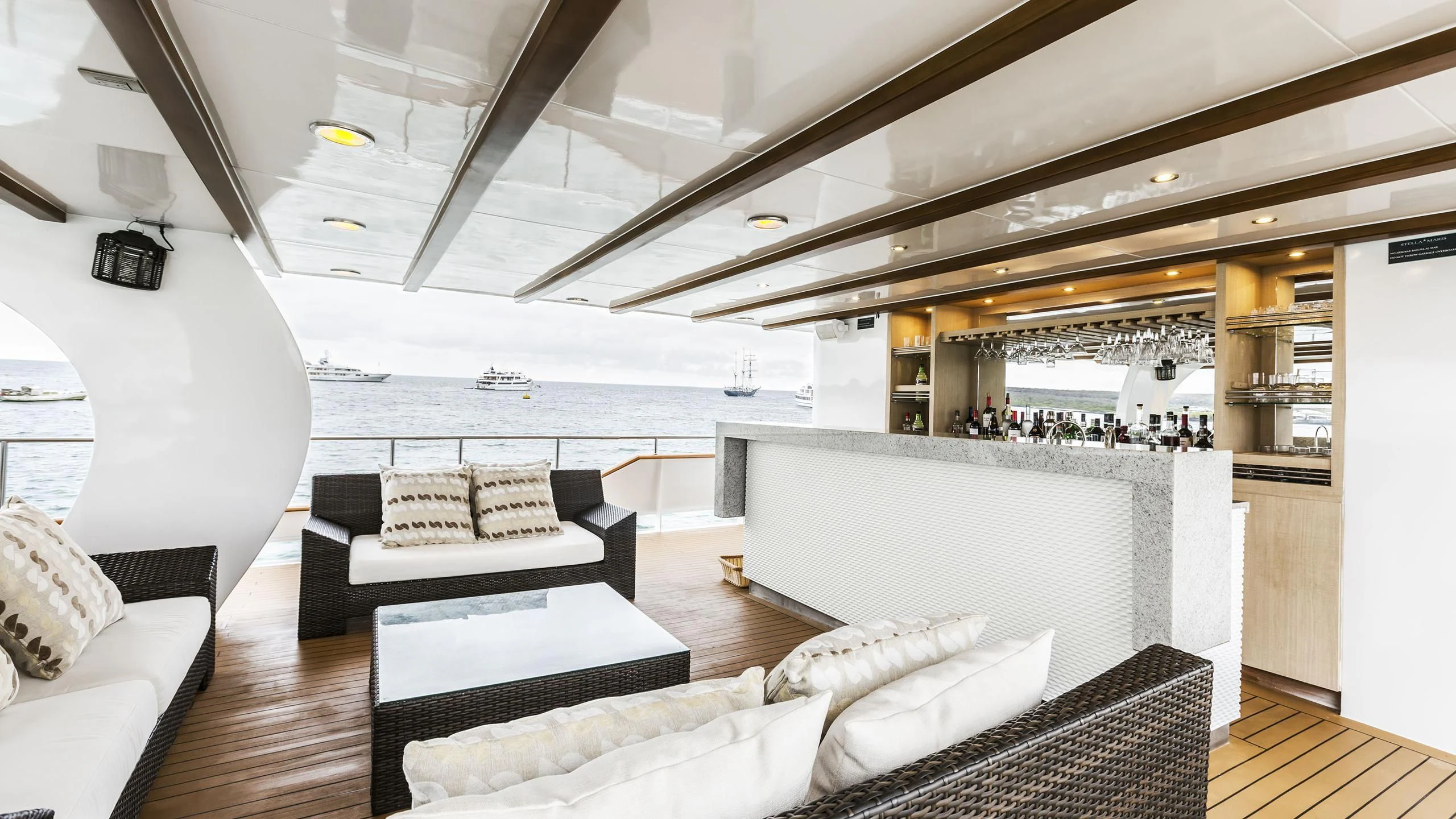 a room with a bed and a couch aboard GALAPAGOS EXPLORER Yacht for Sale