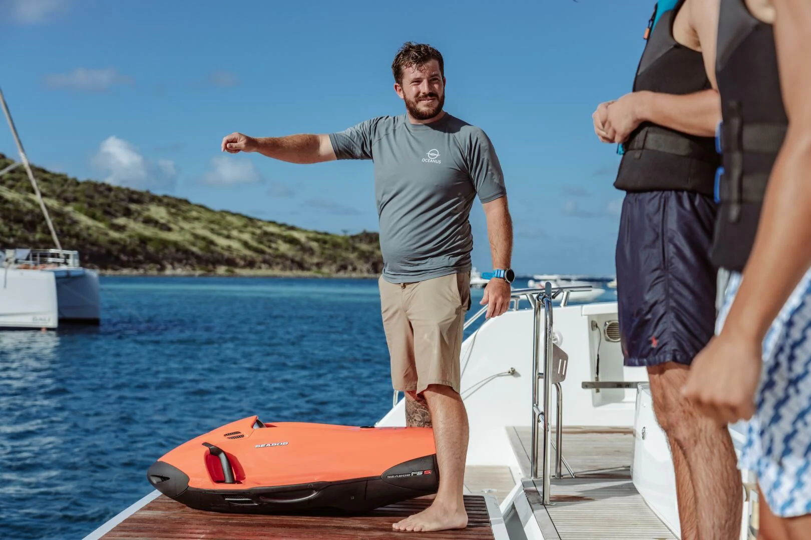 a person standing on a boat aboard OCEANUS Yacht for Sale
