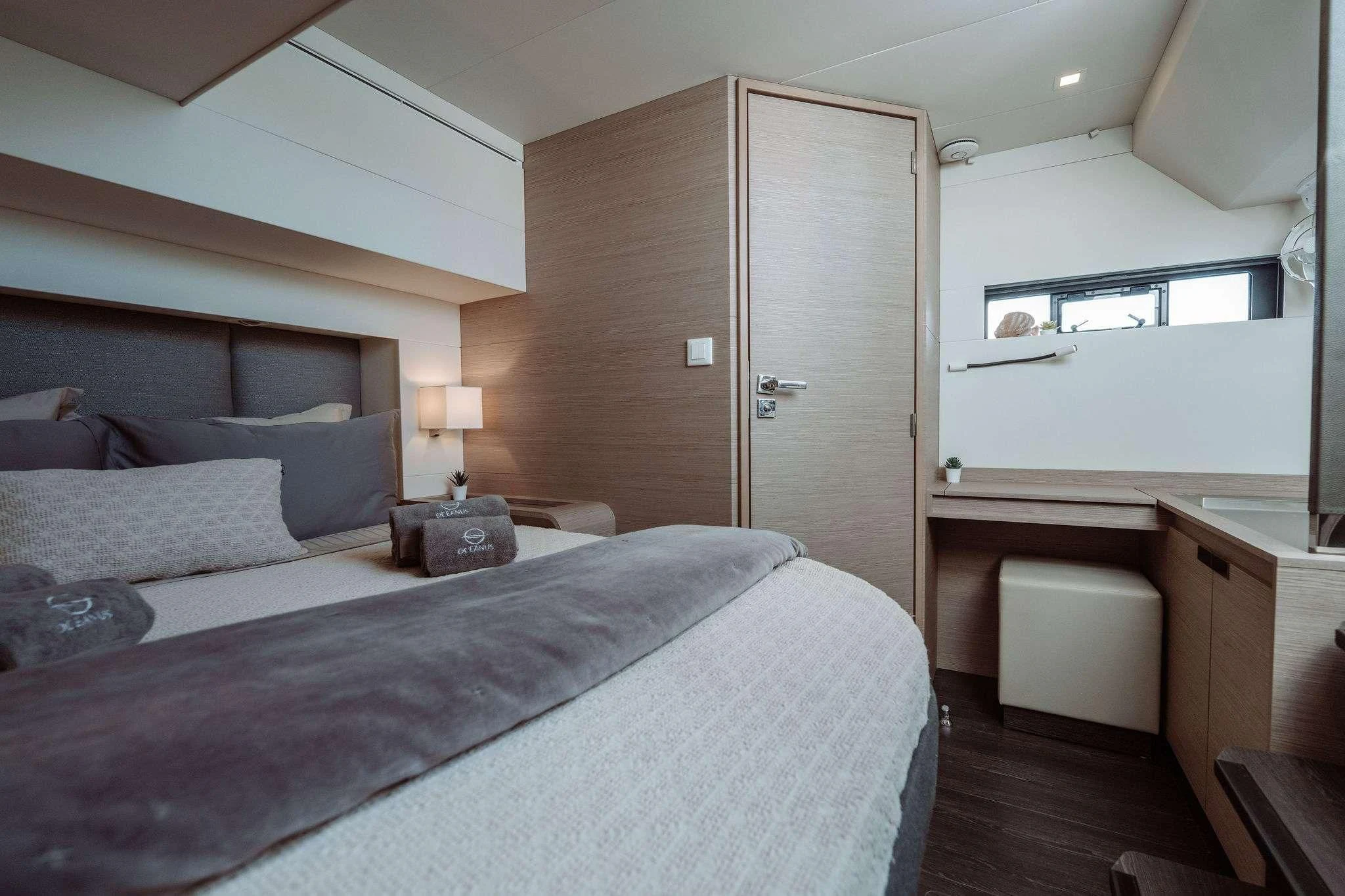 a bed in a room aboard OCEANUS Yacht for Sale