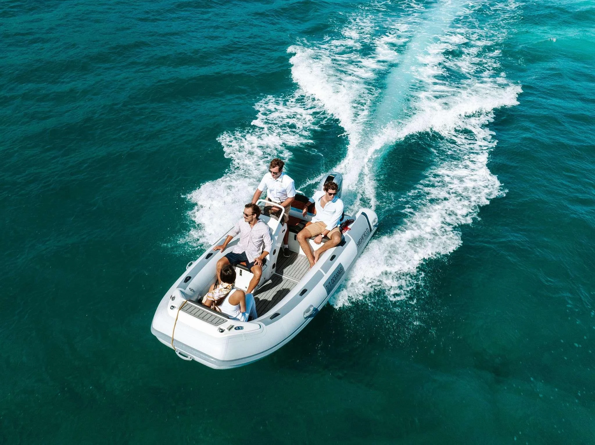 a group of people on a boat aboard OCEANUS Yacht for Sale