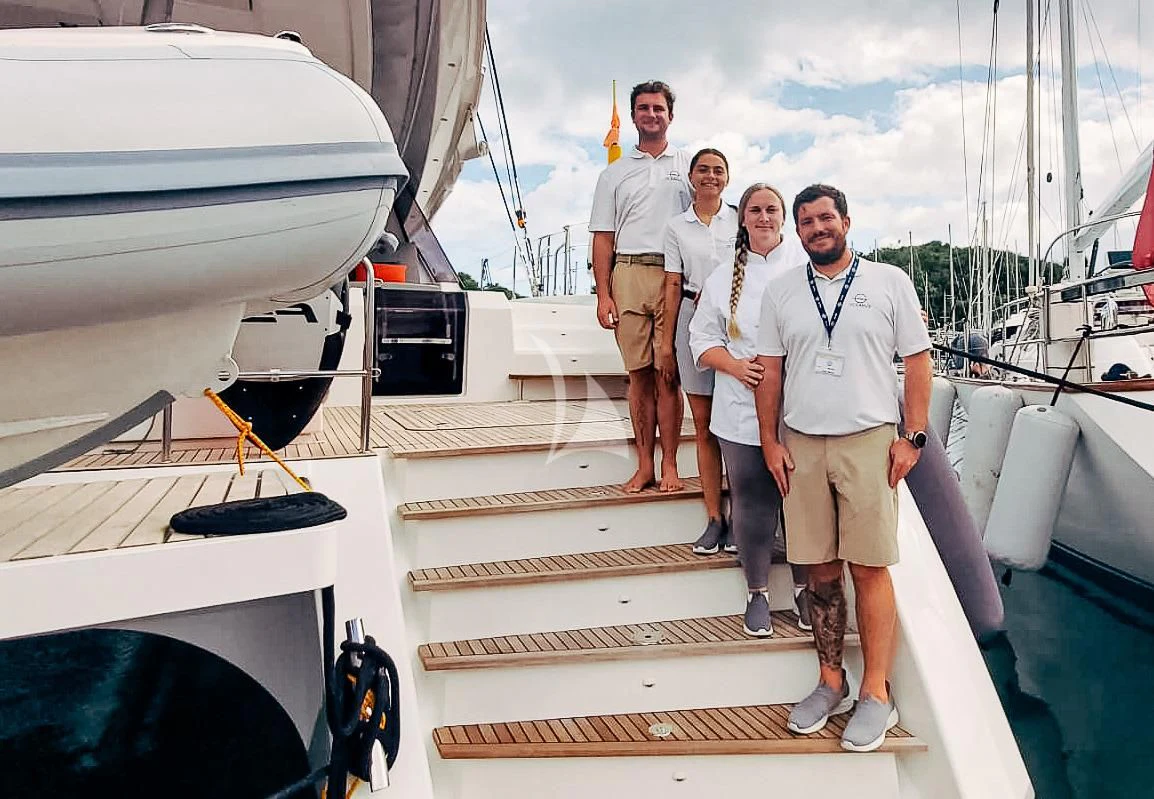 a group of people on a boat aboard OCEANUS Yacht for Sale