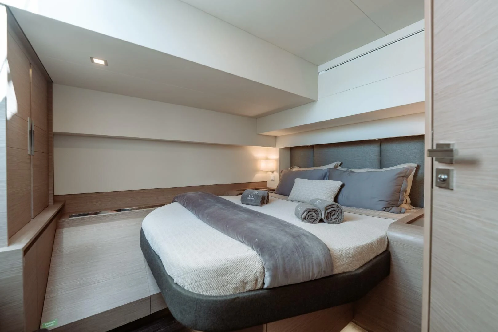 a bed in a room aboard OCEANUS Yacht for Sale