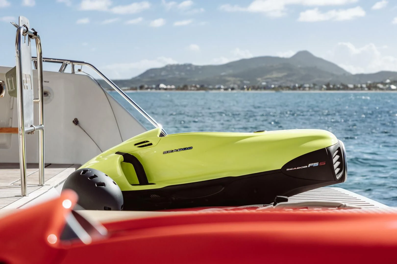a green and black boat on a body of water aboard OCEANUS Yacht for Sale