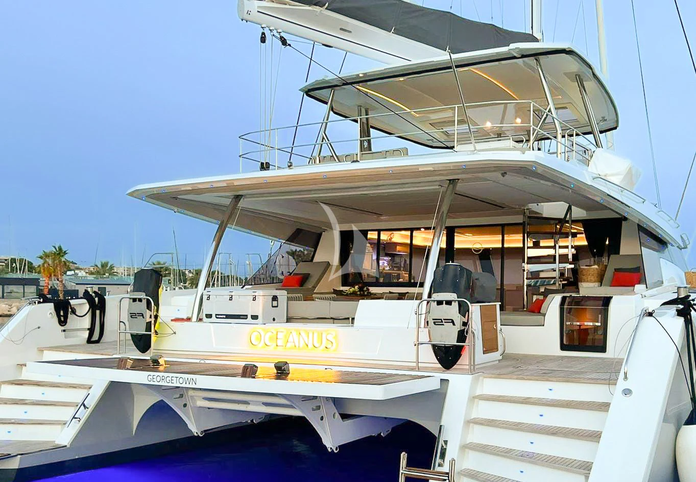 a boat docked at a pier aboard OCEANUS Yacht for Sale