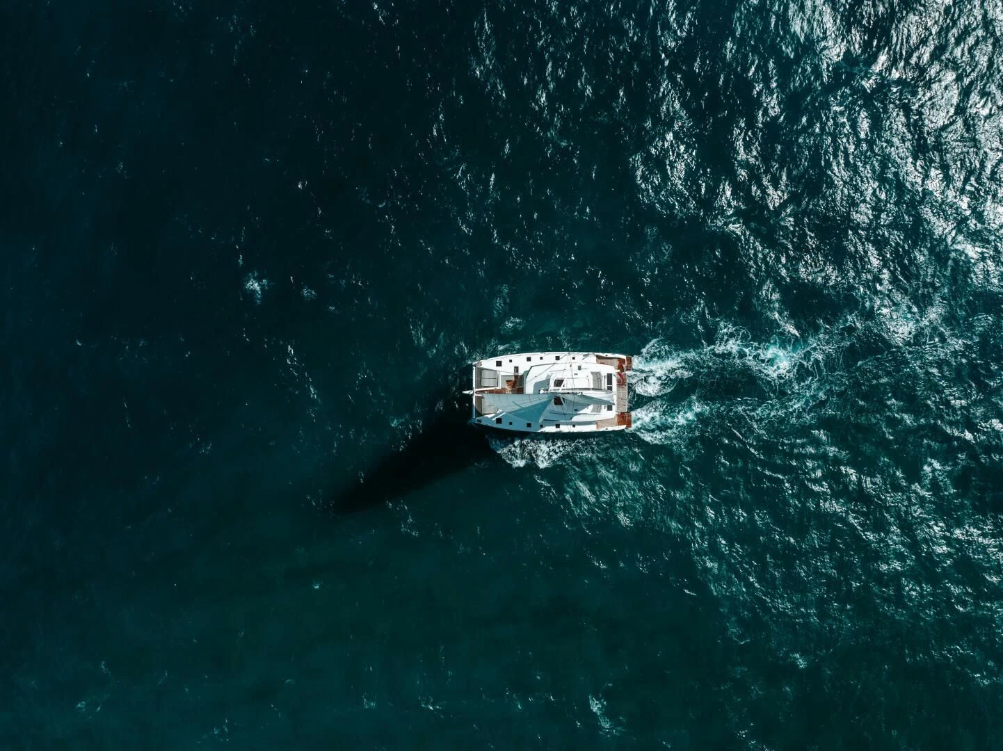 a boat in the water aboard OCEANUS Yacht for Sale