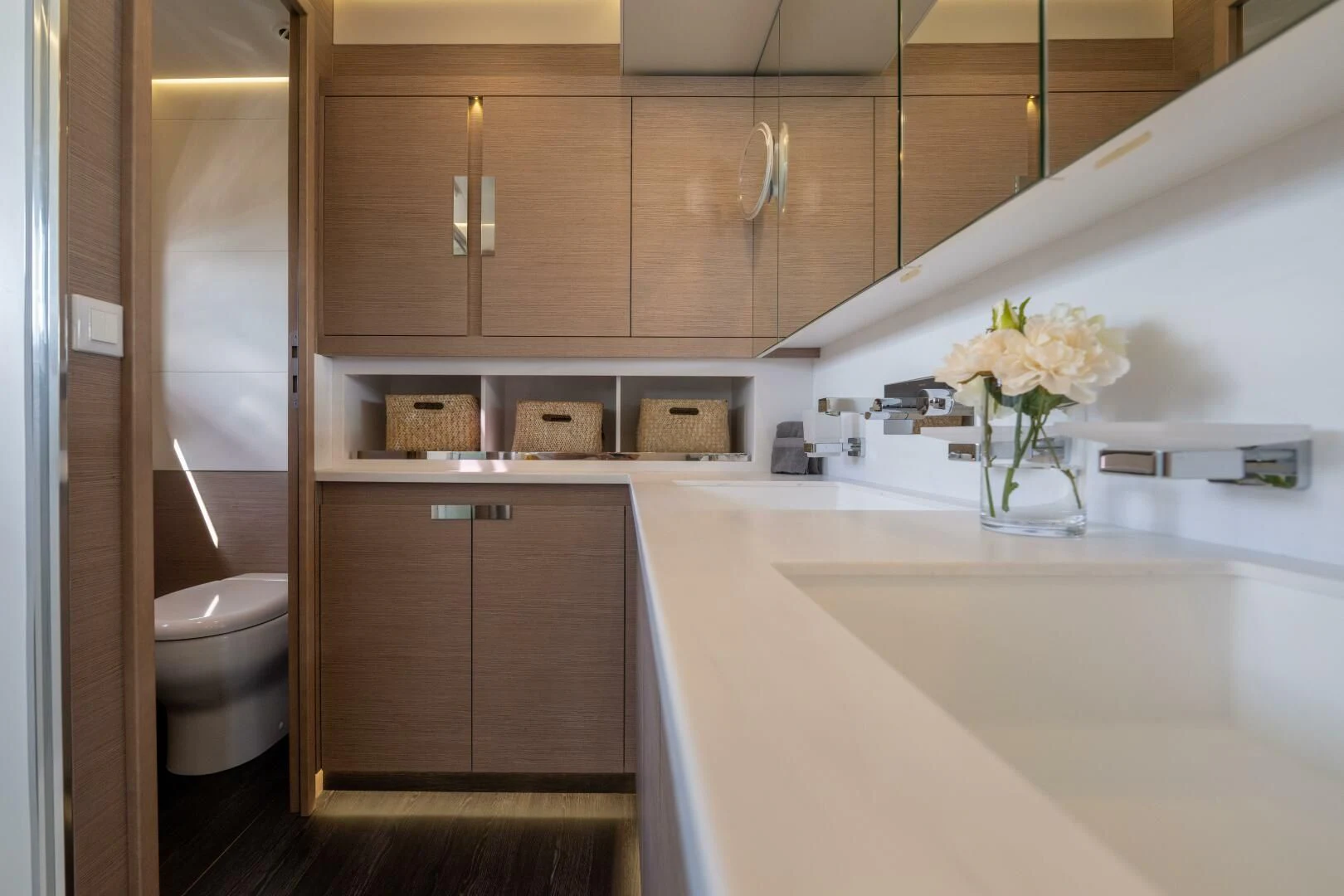 a kitchen with a sink and cabinets aboard OCEANUS Yacht for Sale