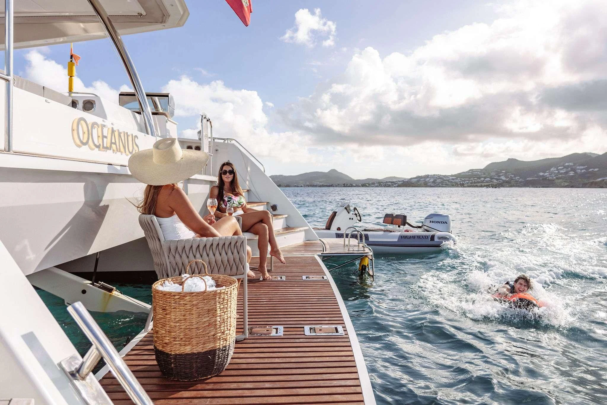 a person sitting on a boat aboard OCEANUS Yacht for Sale