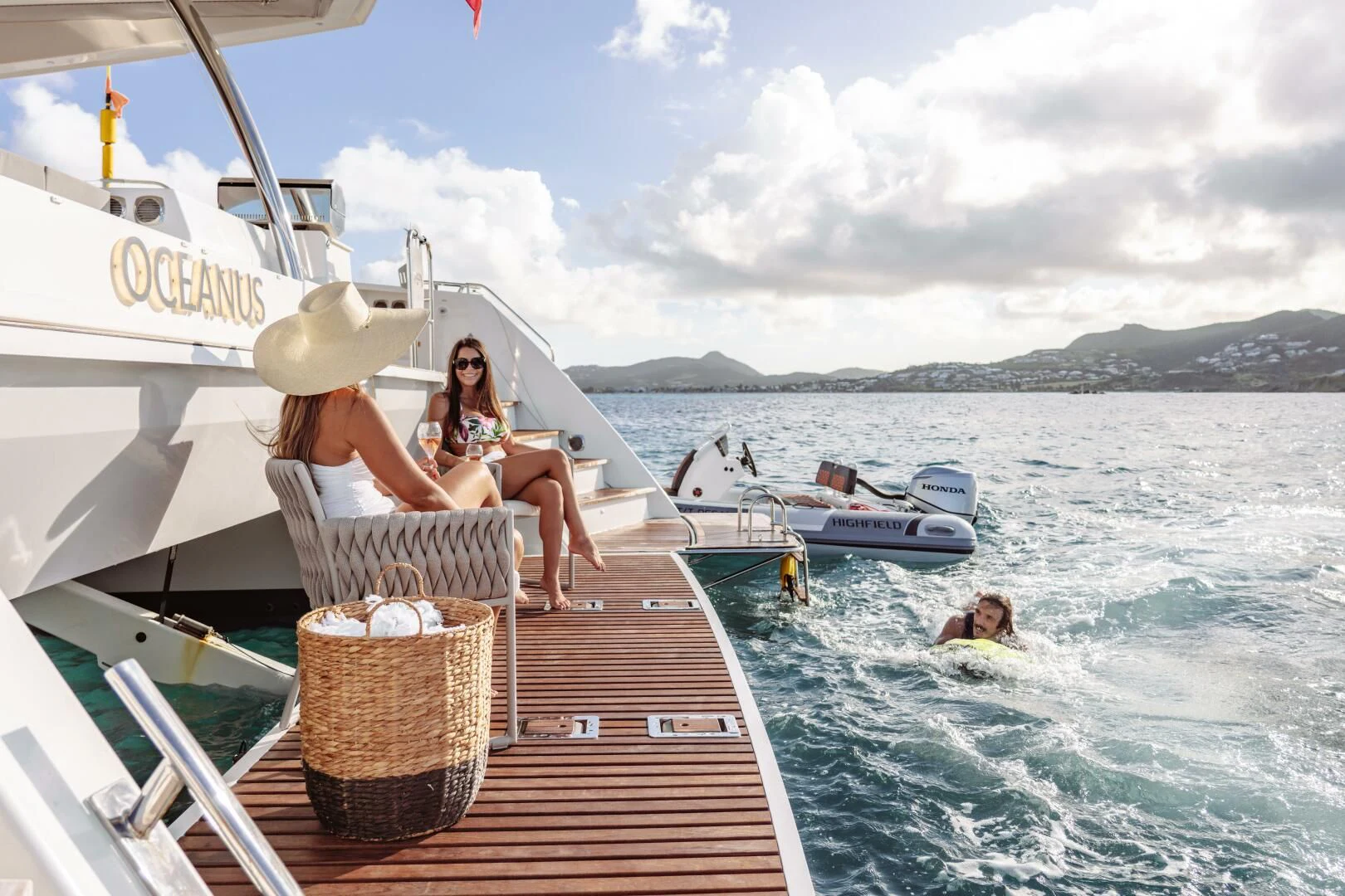 a person sitting on a boat aboard OCEANUS Yacht for Sale