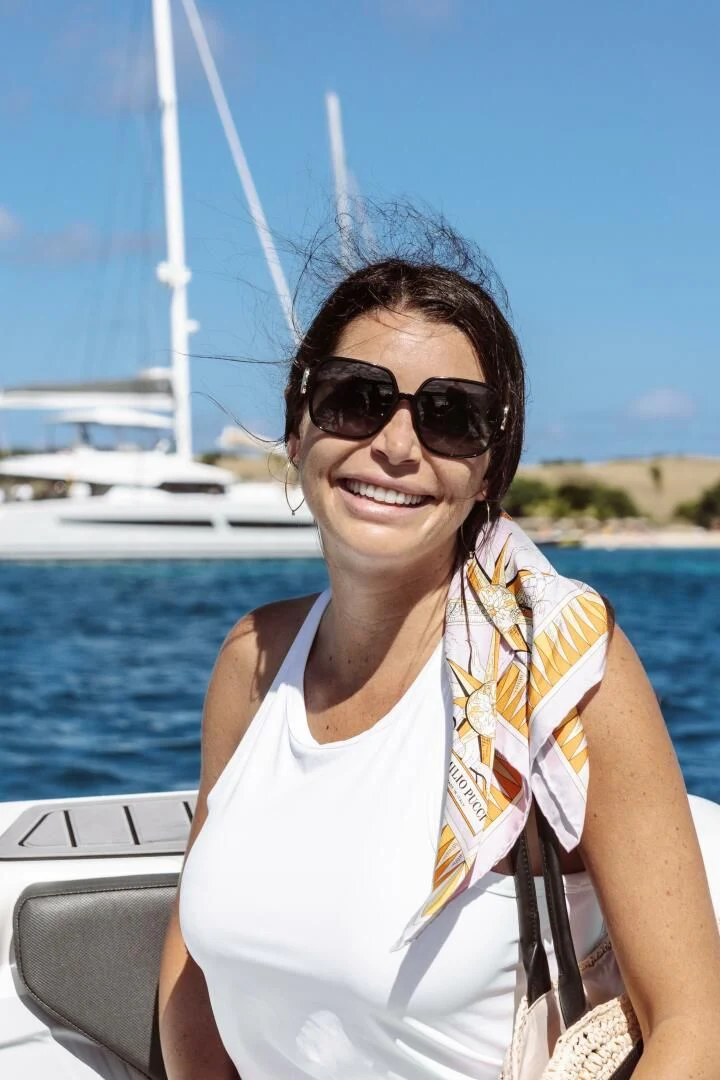 a person wearing sunglasses aboard OCEANUS Yacht for Sale