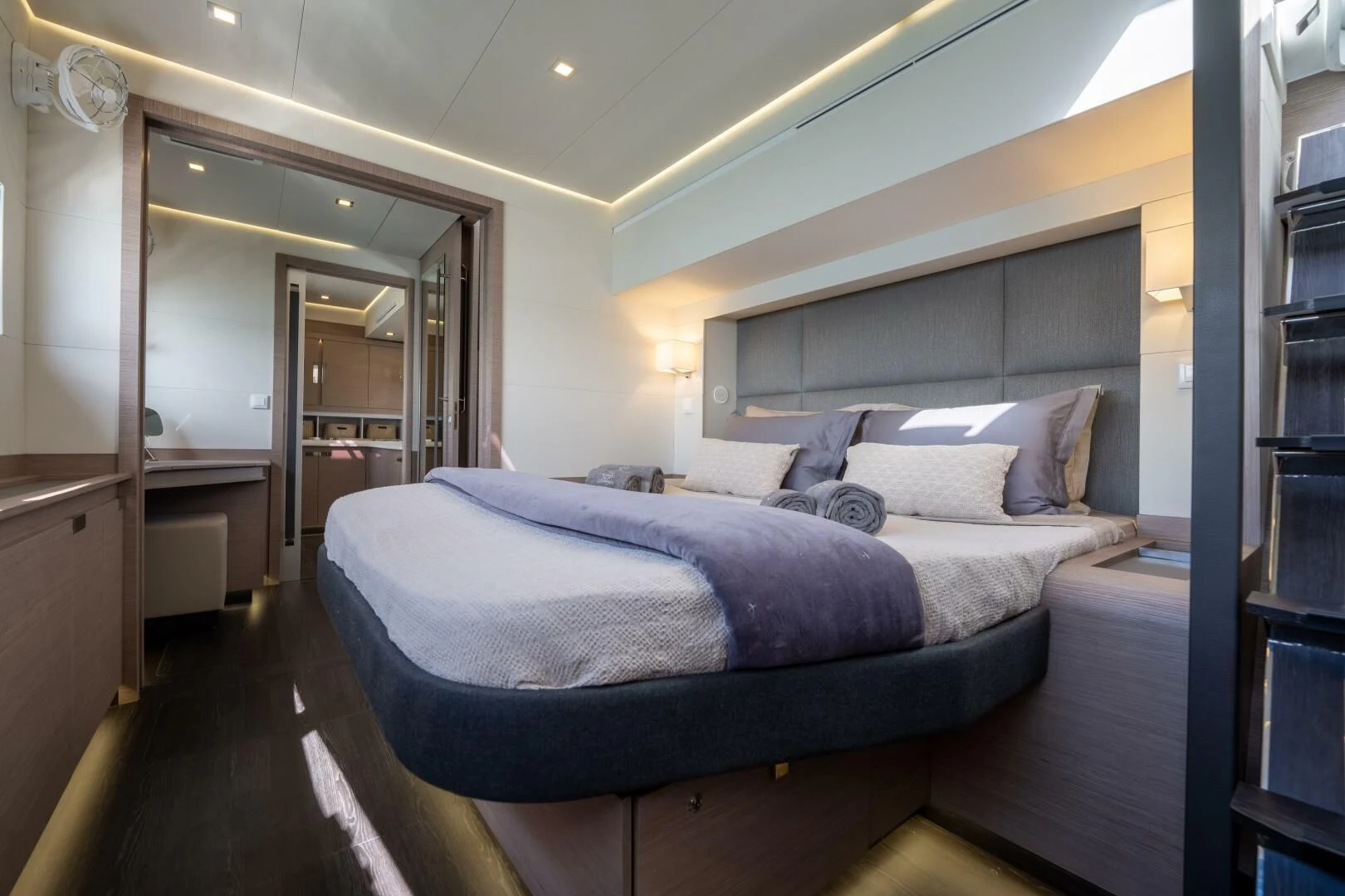 a bed in a room aboard OCEANUS Yacht for Sale
