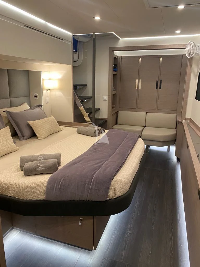 a bed in a room aboard OCEANUS Yacht for Sale