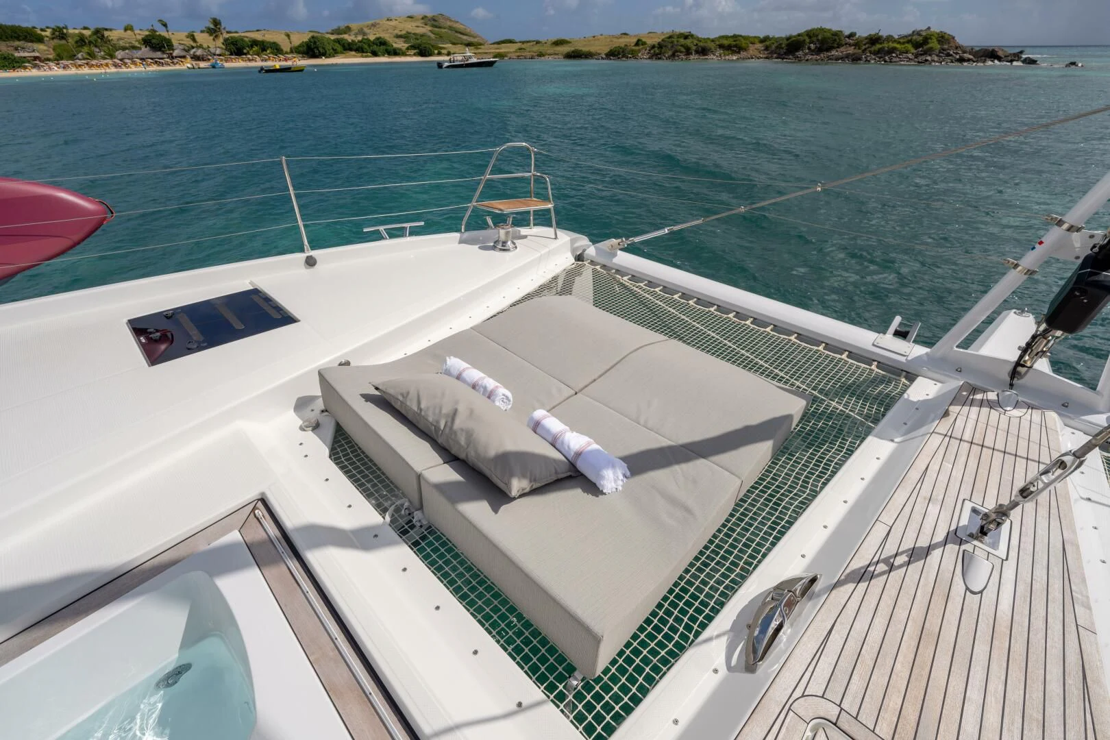 a person lying on a boat aboard OCEANUS Yacht for Sale