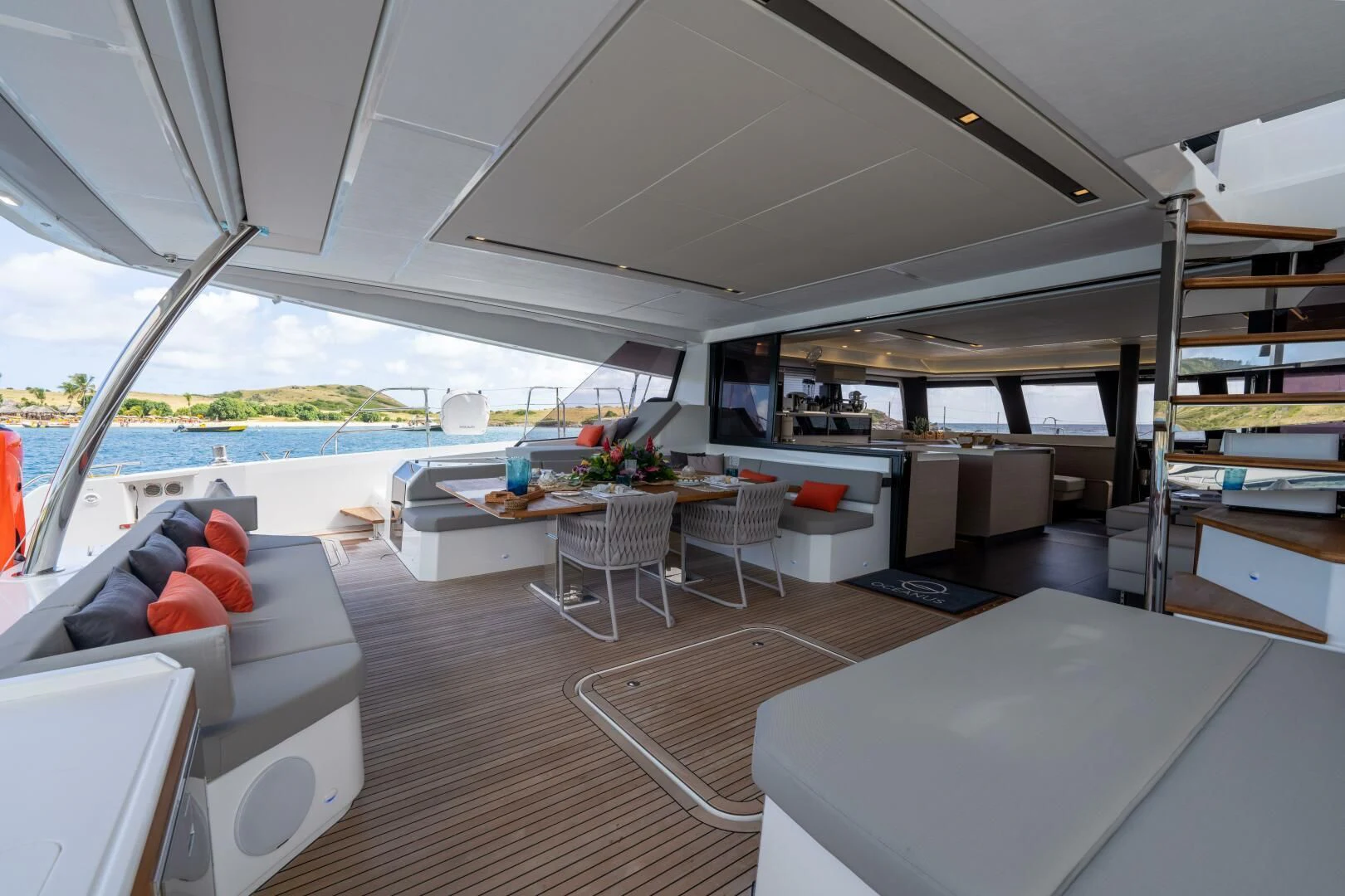 a living room with a large open roof aboard OCEANUS Yacht for Sale