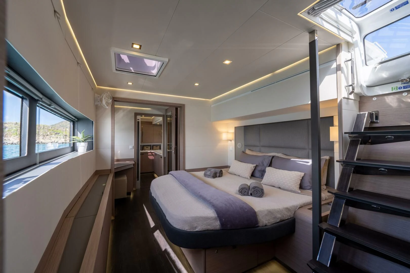 a bed in a room aboard OCEANUS Yacht for Sale
