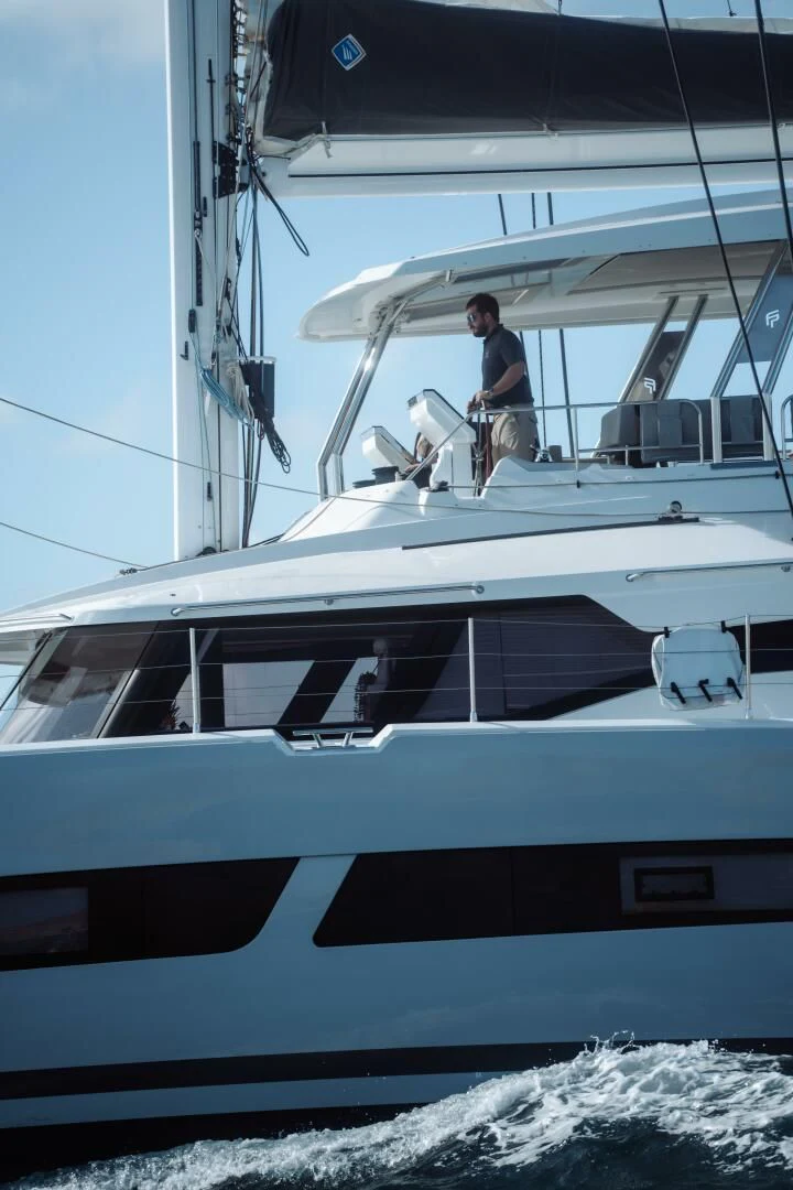 a person standing on a boat aboard OCEANUS Yacht for Sale