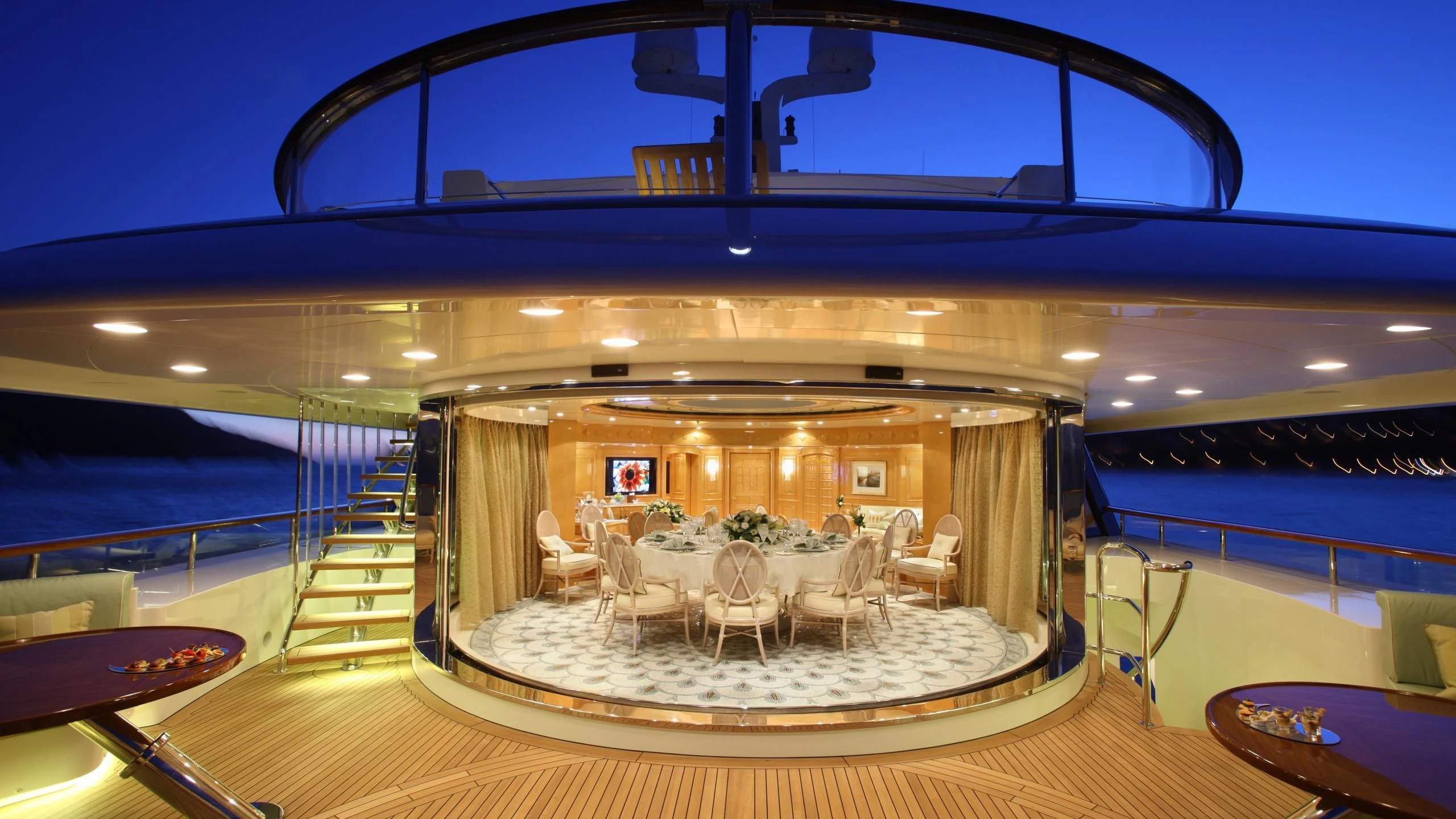a room with tables and chairs aboard ST DAVID Yacht for Sale