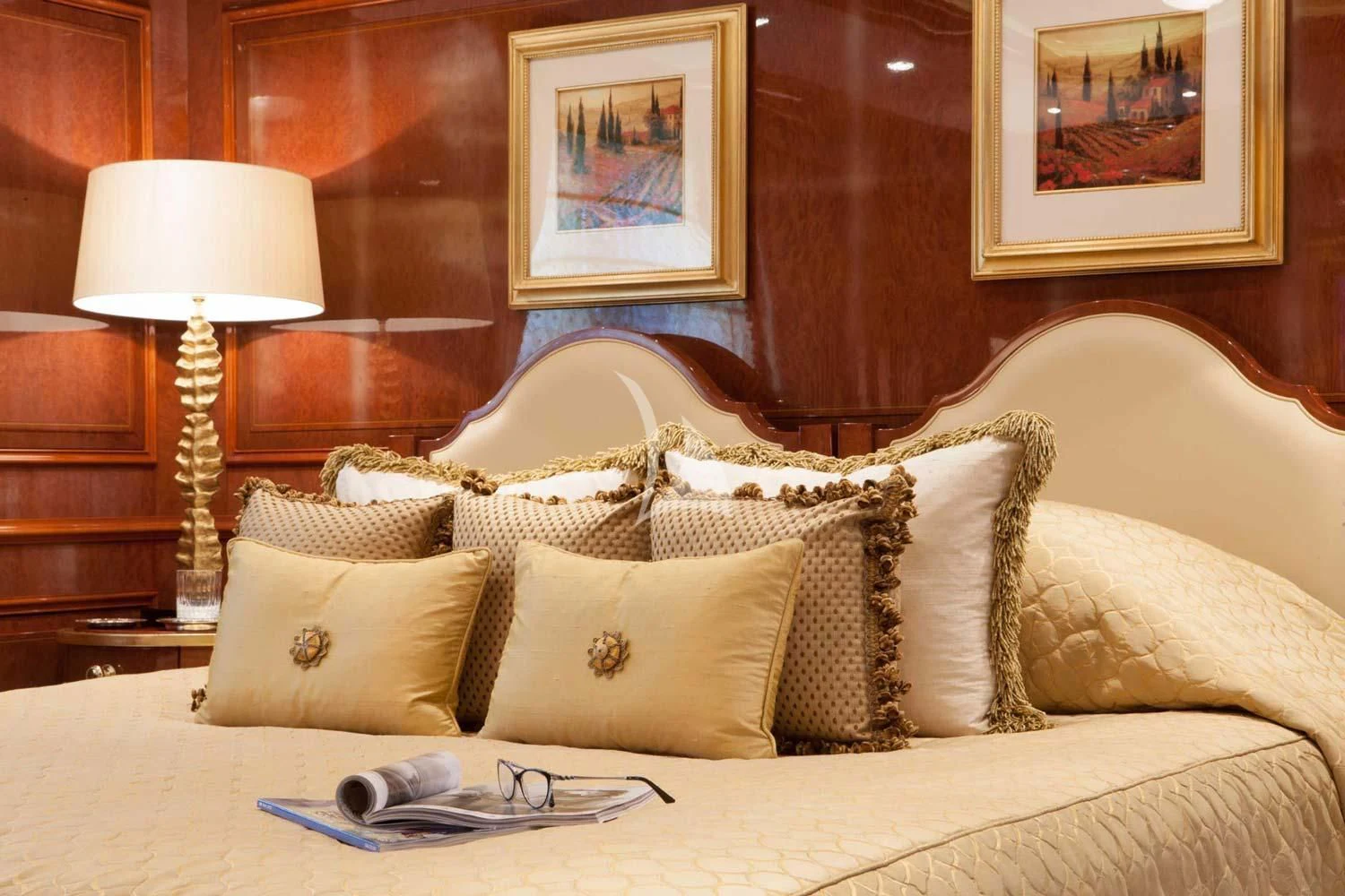 a bed with pillows and a lamp aboard ST DAVID Yacht for Sale