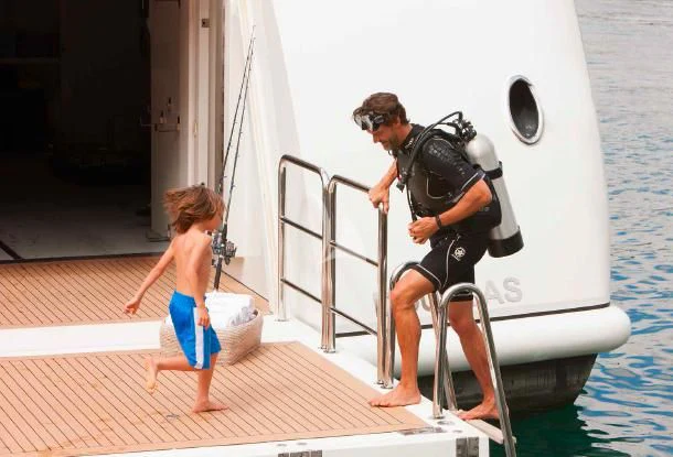 a person and a child on a boat aboard ST DAVID Yacht for Sale
