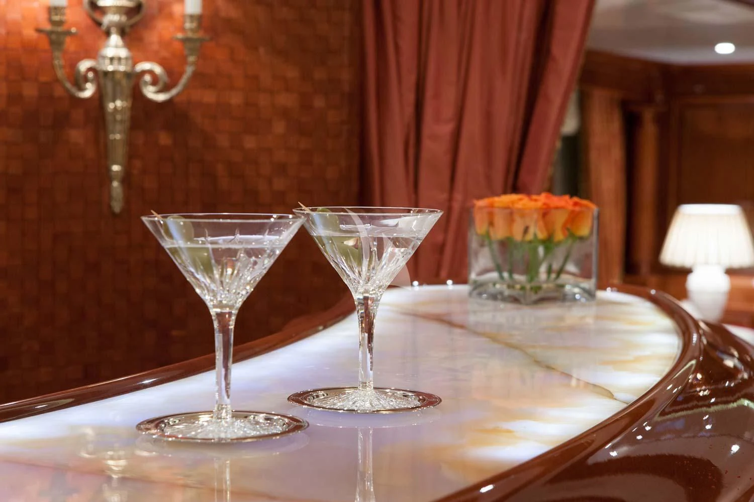 a group of glasses with drinks on a table aboard ST DAVID Yacht for Sale