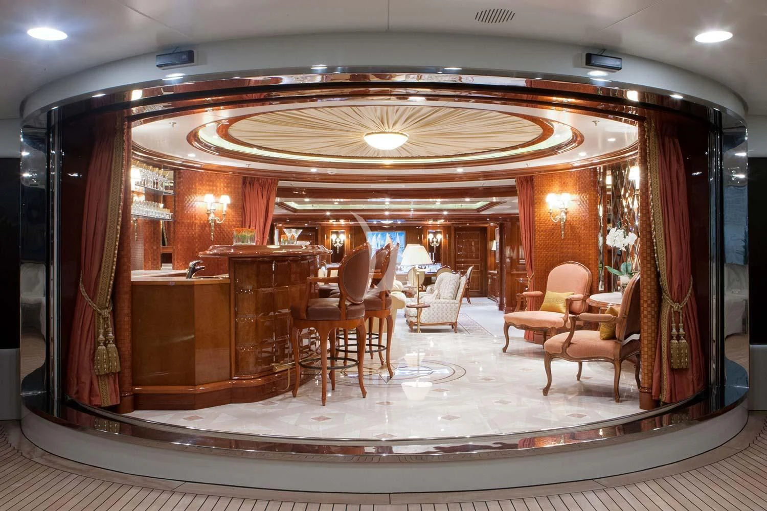 a large room with chairs and a table aboard ST DAVID Yacht for Sale