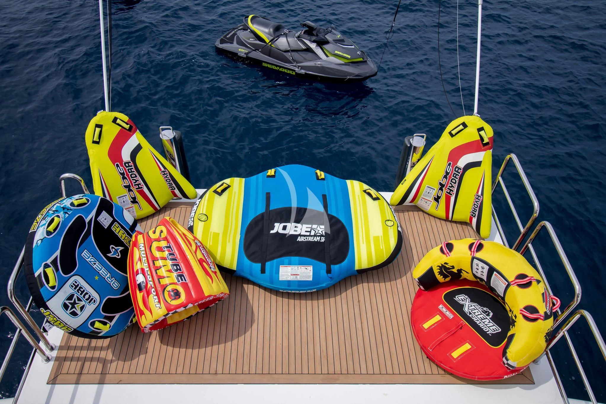 a group of kayaks on a wooden surface aboard ST DAVID Yacht for Sale