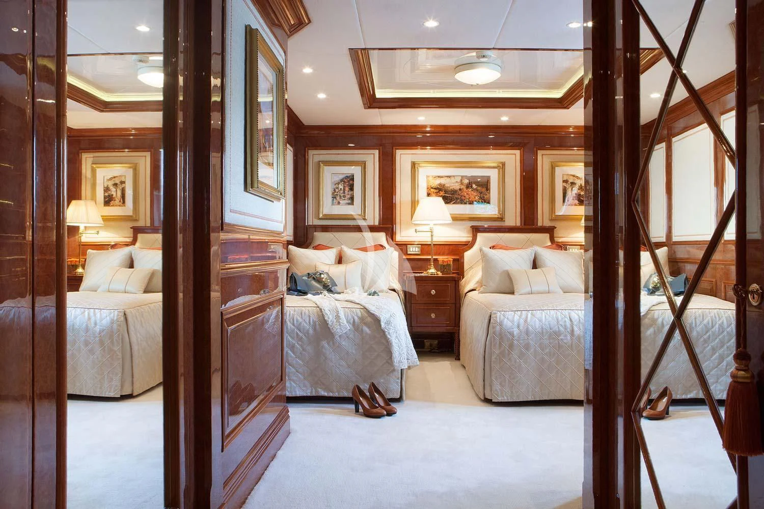 a room with a couple of beds aboard ST DAVID Yacht for Sale