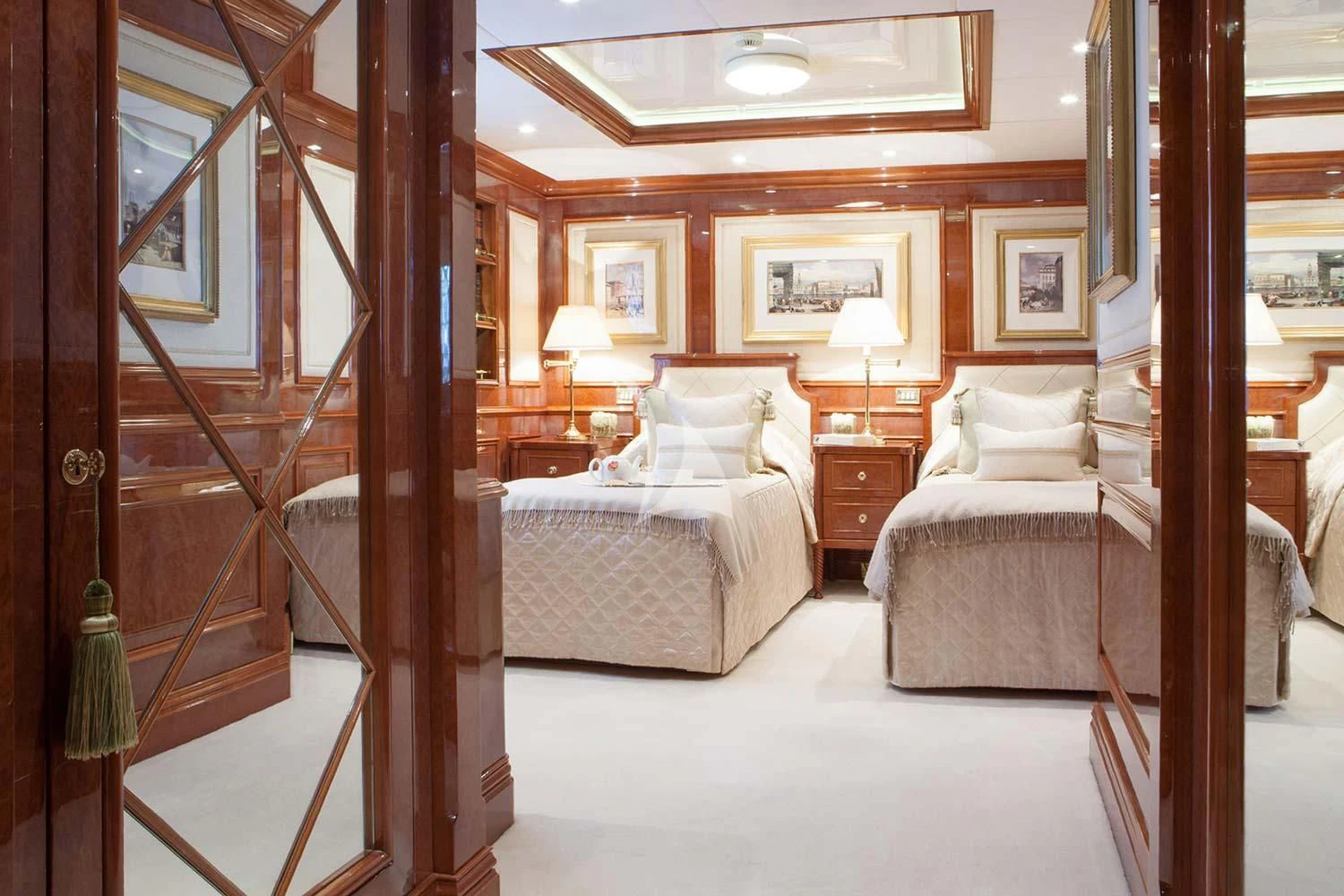 a room with a bed and a mirror aboard ST DAVID Yacht for Sale