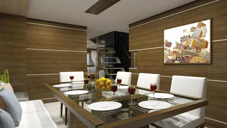 a table with wine glasses and food on it aboard ST DAVID Yacht for Sale