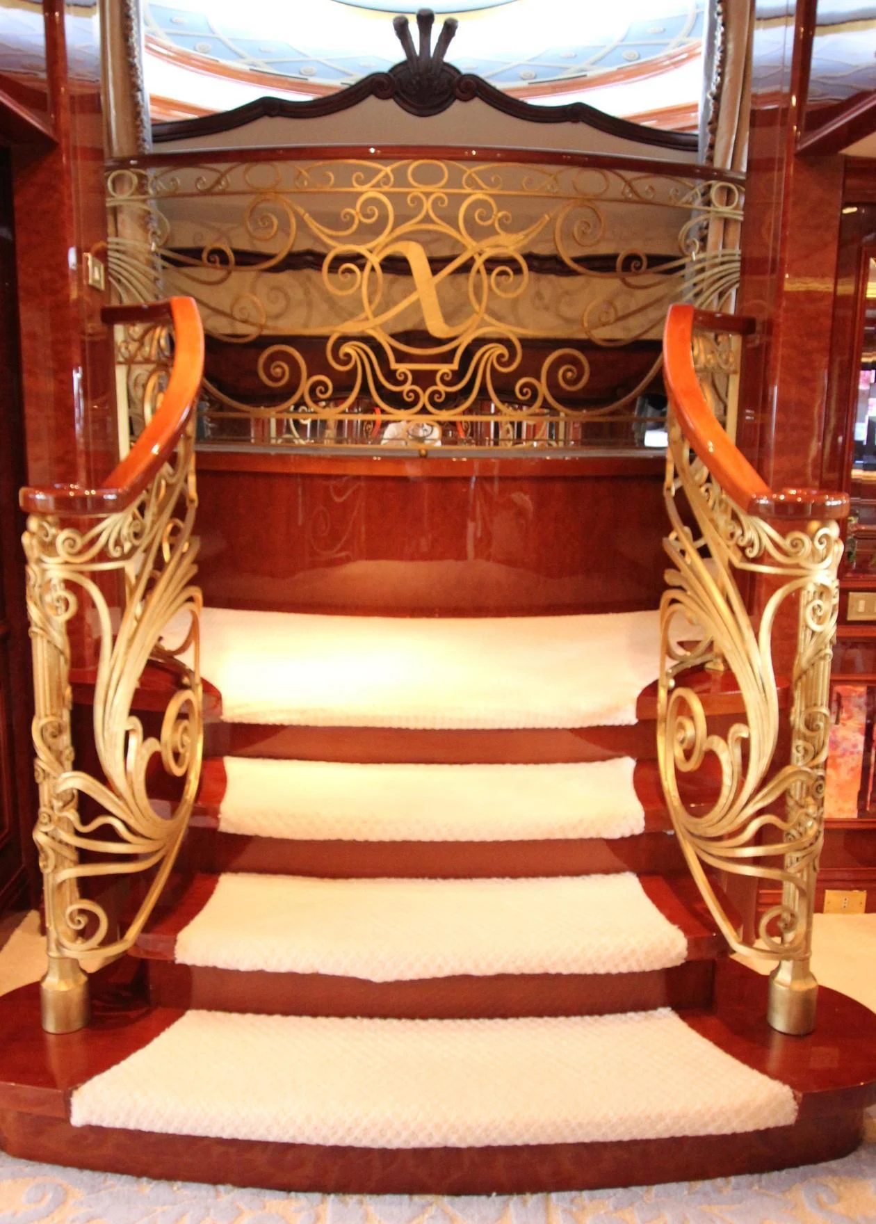 a gold and black staircase aboard ST DAVID Yacht for Sale