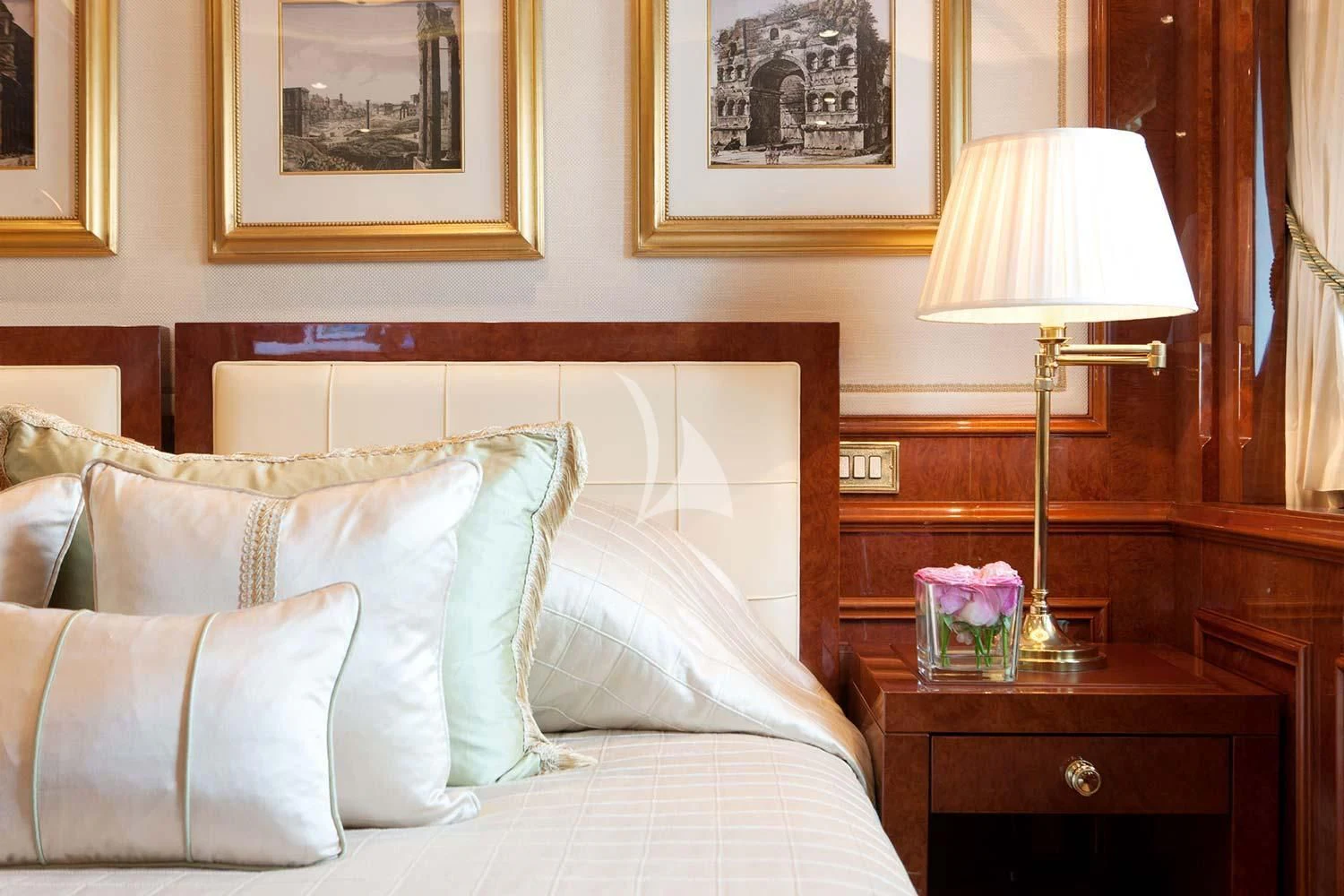 a bed with a lamp on it aboard ST DAVID Yacht for Sale