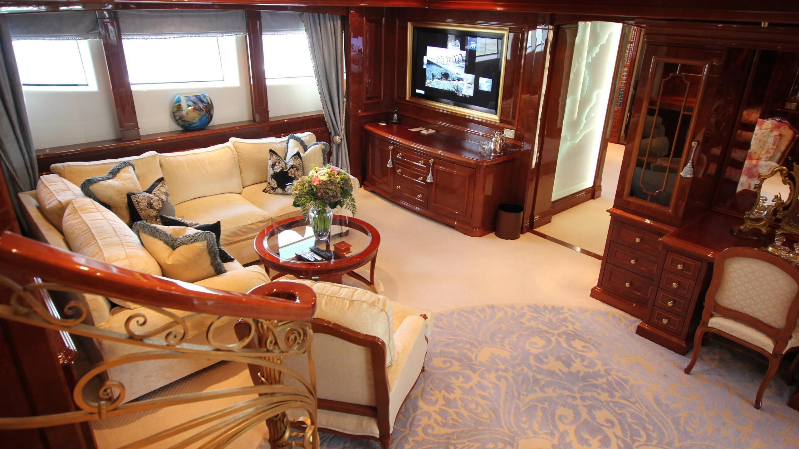 a living room with a couch and a television aboard ST DAVID Yacht for Sale