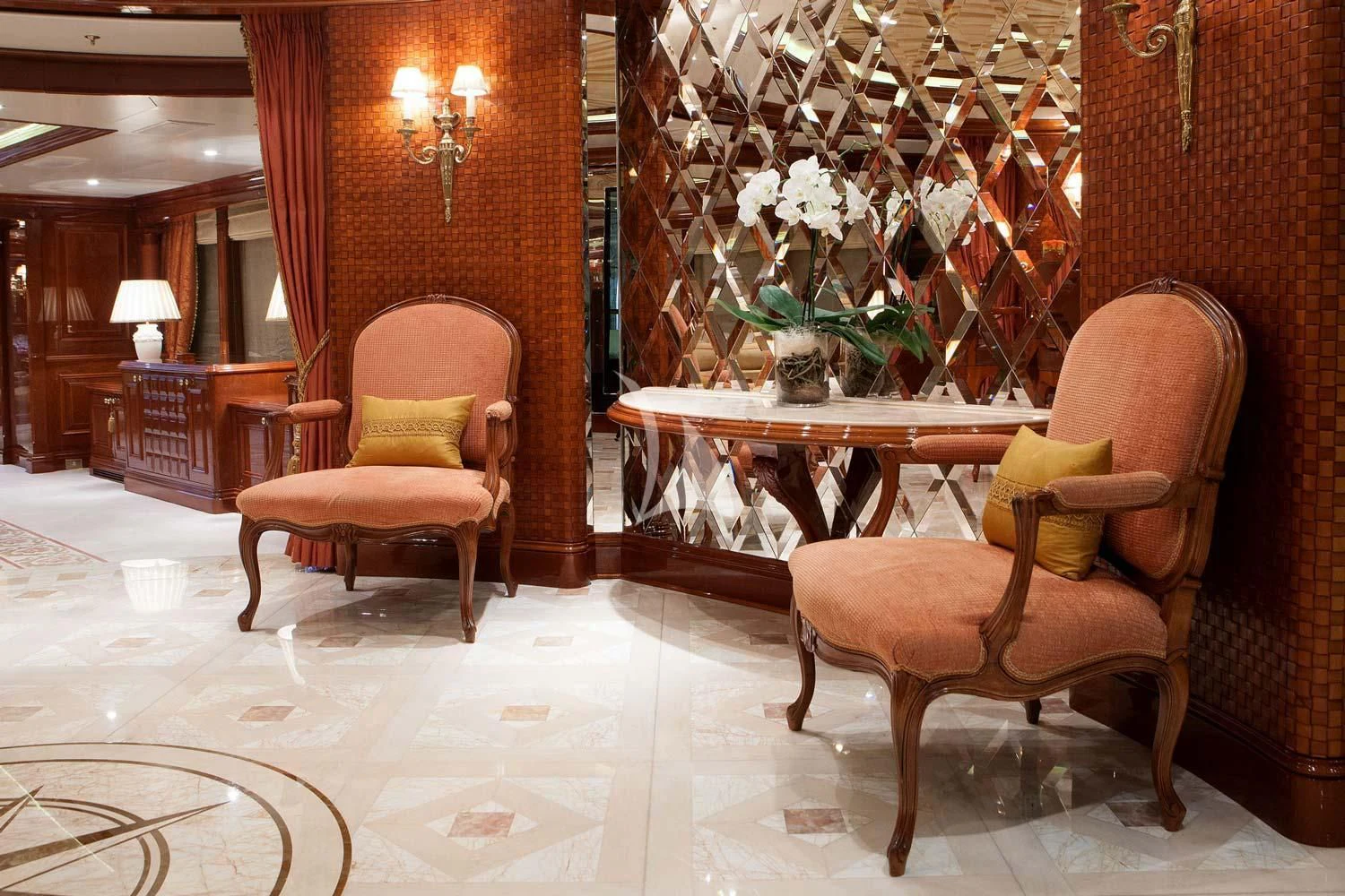 a room with a table chairs and flowers in it aboard ST DAVID Yacht for Sale