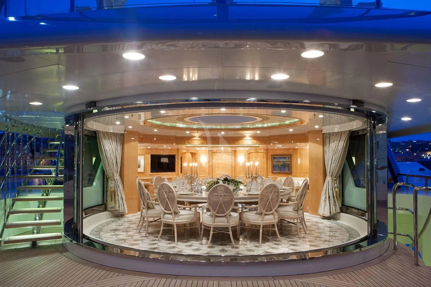 a large room with tables and chairs aboard ST DAVID Yacht for Sale