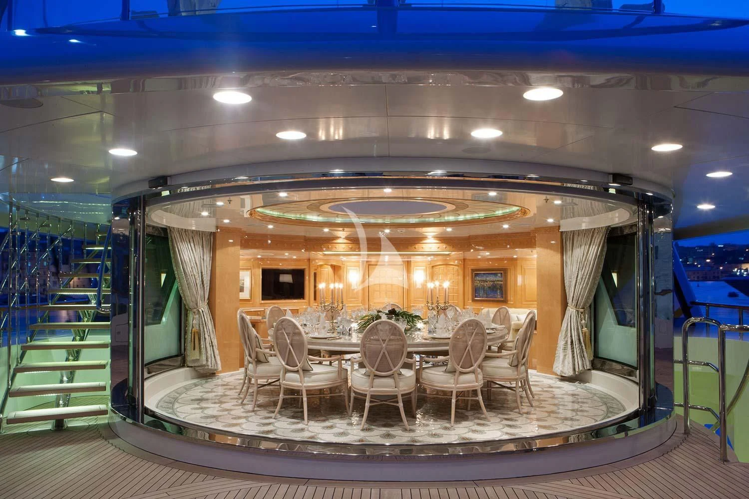 a large room with tables and chairs aboard ST DAVID Yacht for Sale