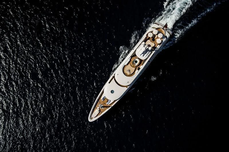 a gold metal object on a black surface aboard ST DAVID Yacht for Sale